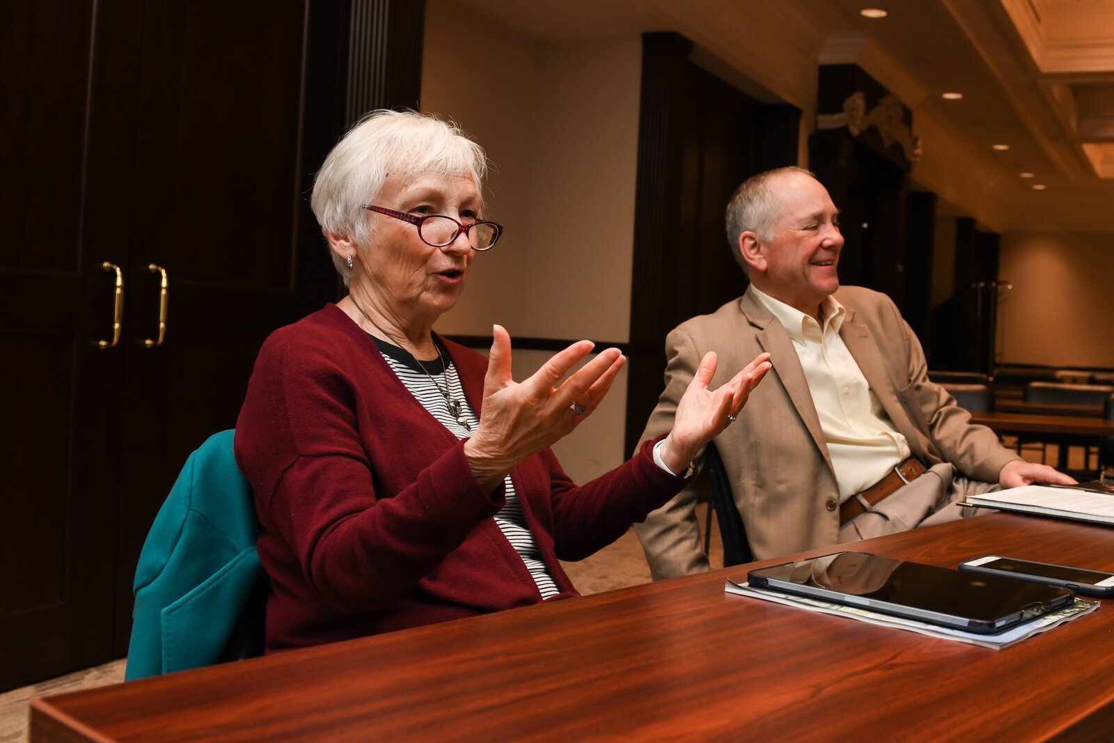 Becky Weimerskirch, left, speaks during a council meeting with members of the Mayor's Age-Friendly Council at Citizen's Square.