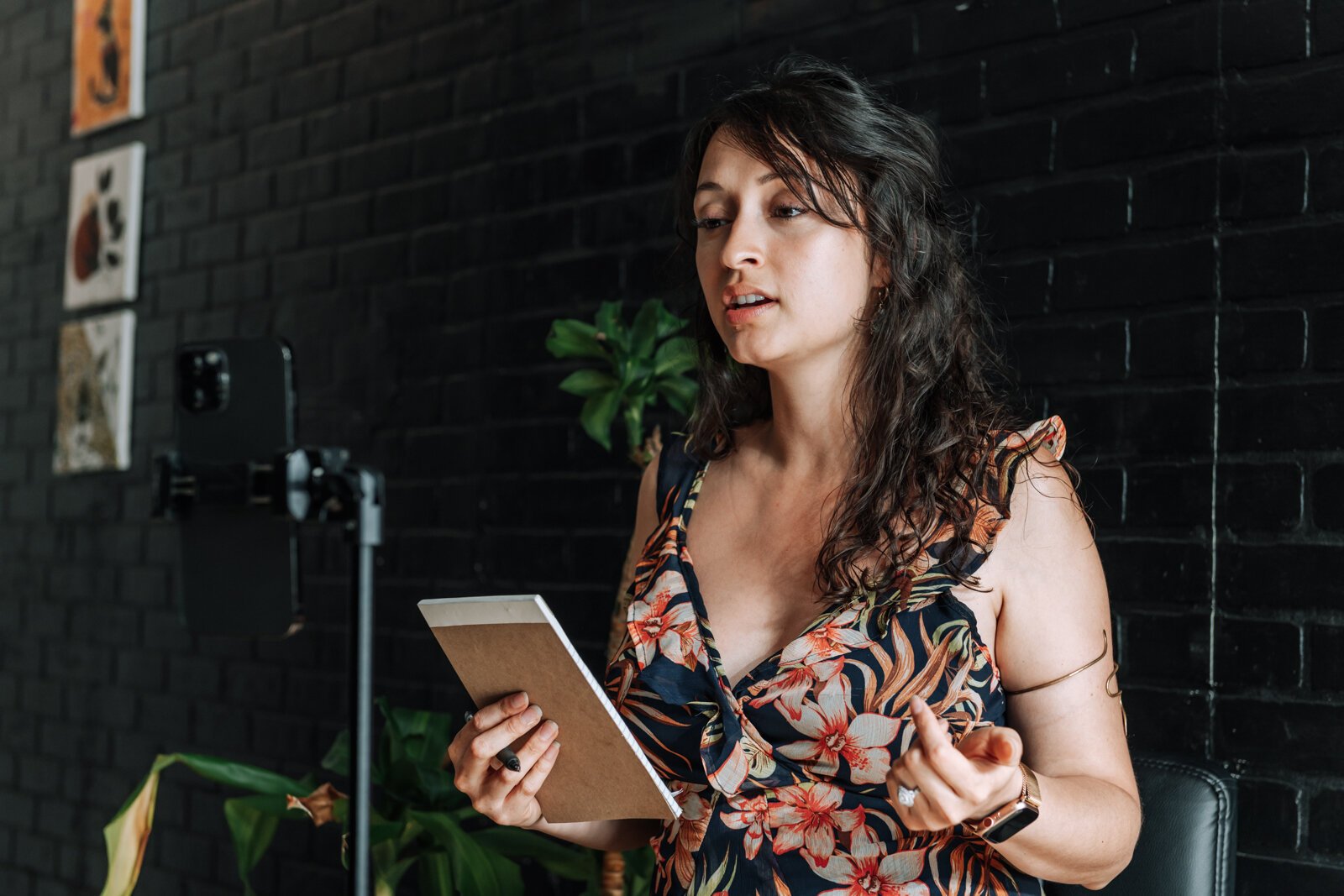 Gladys Calderon, a social media creator whose content on mental health has generated 75,000 views on TikTok, works on practicing for an upcoming video in her home.