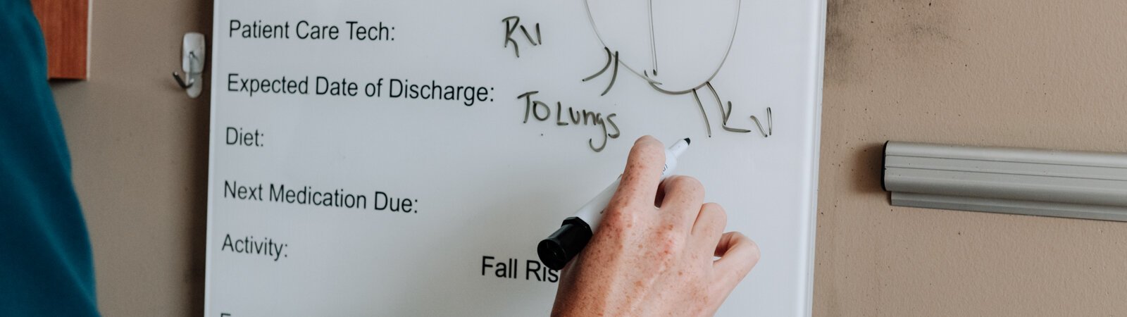 Colin Fassold, Registered Nurse, shows how he gives a visual to patients to help them at Parkview Regional Medical Center.