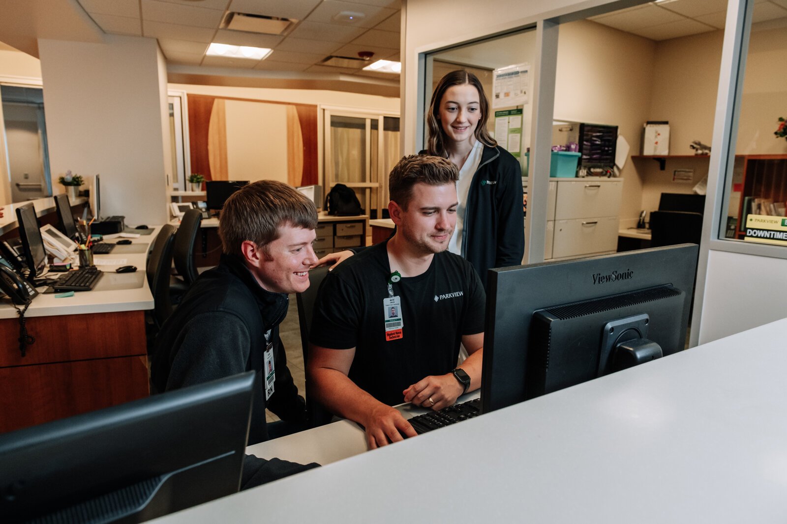 From left: Colin Fassold, Registered Nurse, Jayce Colclasure, Student Nurse Apprentice and Bryn Benzing, Student Nurse Assistant, work together at Parkview Regional Medical Center.