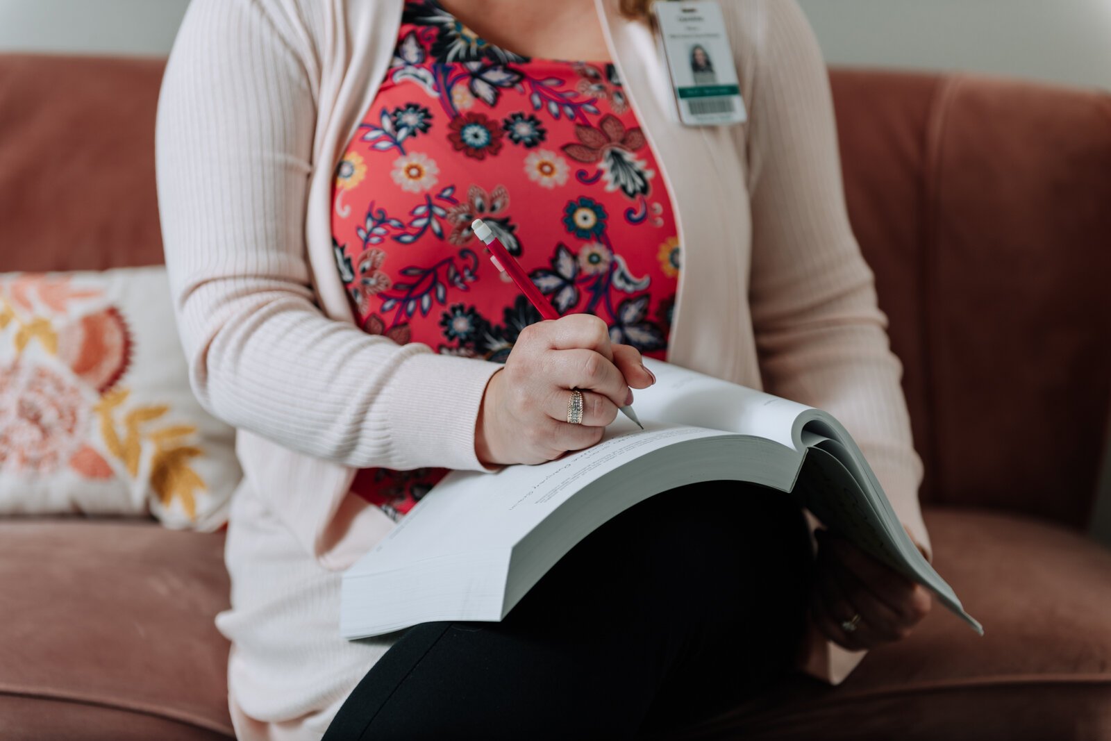 Caroline Braun, Clinical Programs Manager for Parkview Behavioral Health Institute, shows what taking notes looks like after a mock therapy session at Park Center, 2710 Lake Ave.