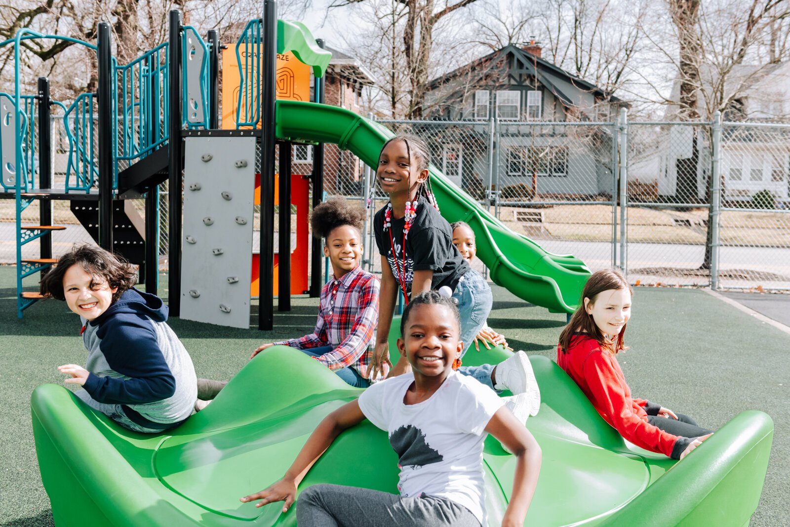 Children enjoy the playground equipment during the fourth grade recess at Forest Park Elementary School.