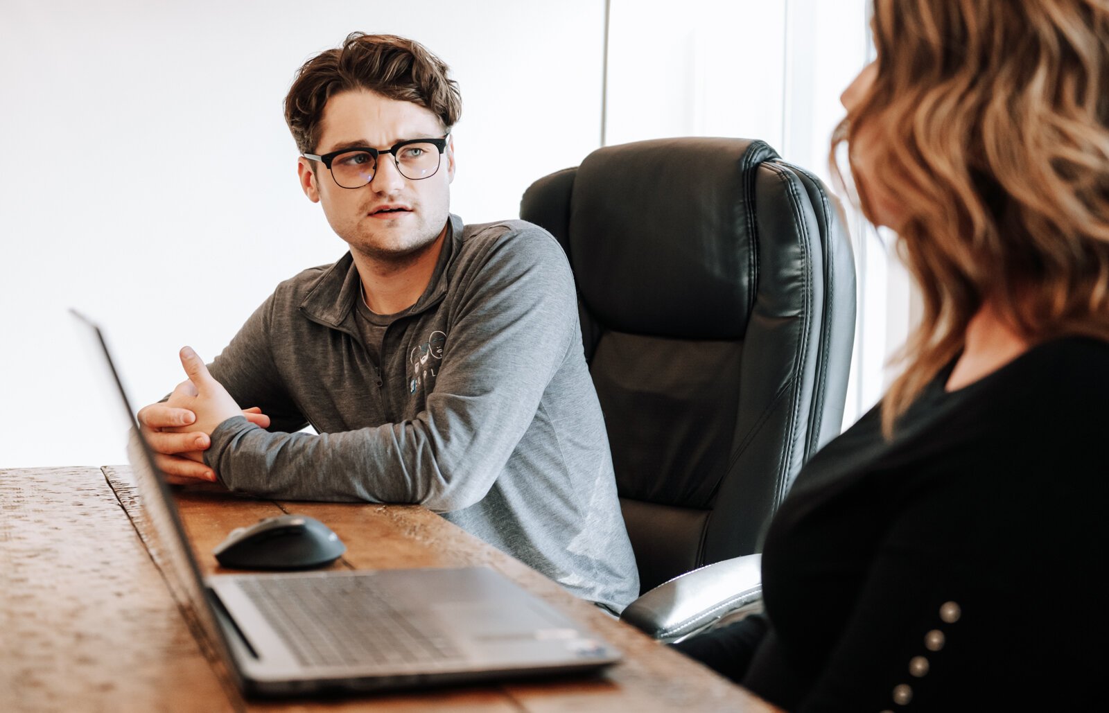 Ben Schwartz, Account Executive, speaks to other team members during a meeting at 3BG SUPPLY CO.