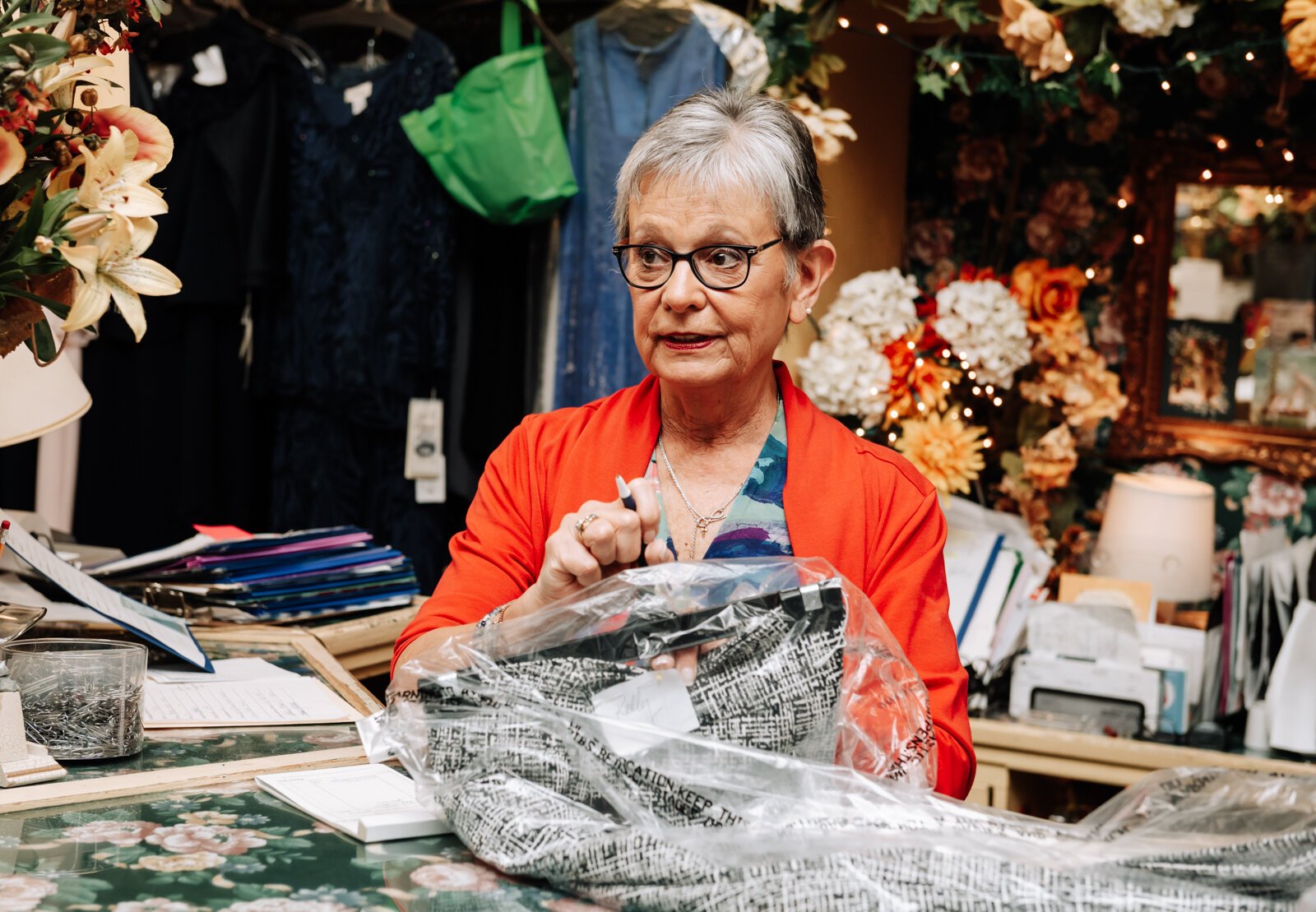 Bobbi Palmer, assistant sales, helps customer Kelly Thompson (not pictured) with a purchase at The Francis Shoppe.