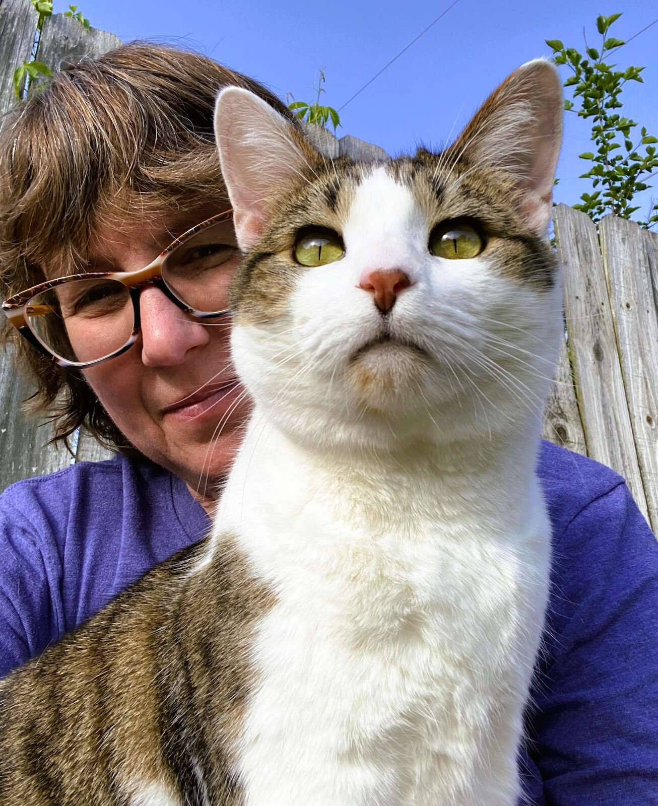 Jennie Renner, author of this story, and one of her cats, Grandpa Eugene
