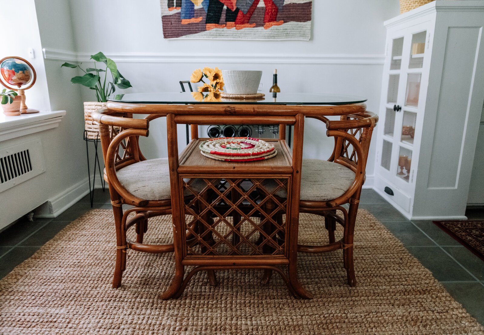 A table purchased from the Salvation Army fits well in the dining space in the apartment of Jamie Curtis.