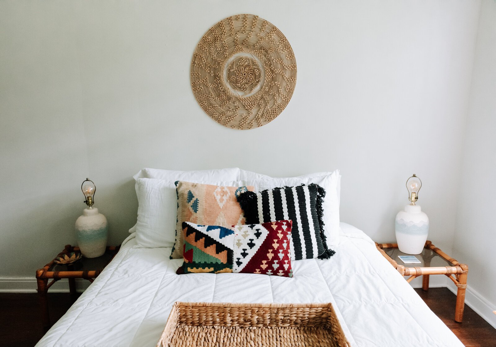 The bedroom features a lot of light as well as colors and textures to make the room pop in the apartment of Jamie Curtis on Edgewater Ave.