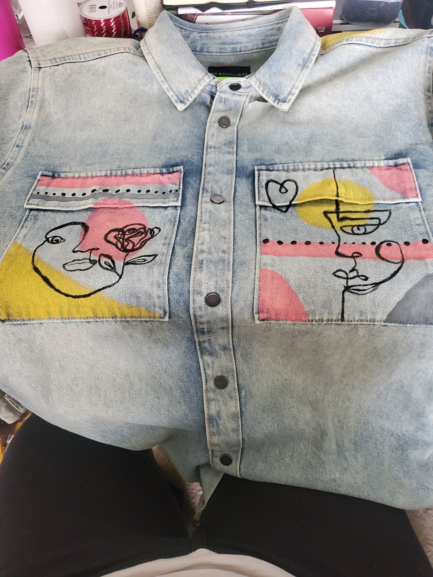 Jordan Latham​​​​​​​ began Jola Ariel Art & Boutique by painting her designs onto denim and transferring them to other clothing using a vinyl heat press.