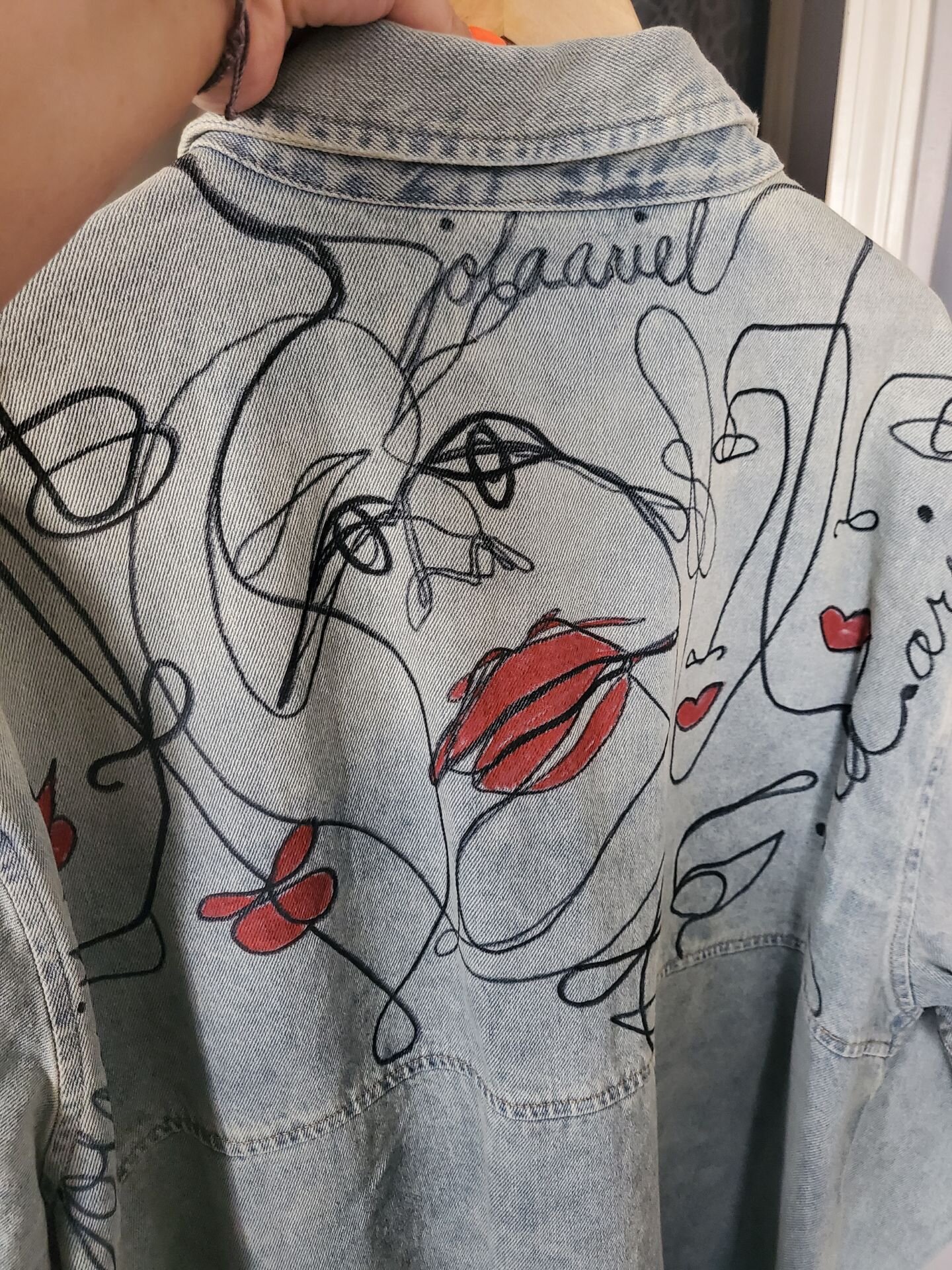 Jordan Latham​​​​​​​ began Jola Ariel Art & Boutique by painting her designs onto denim and transferring them to other clothing using a vinyl heat press.