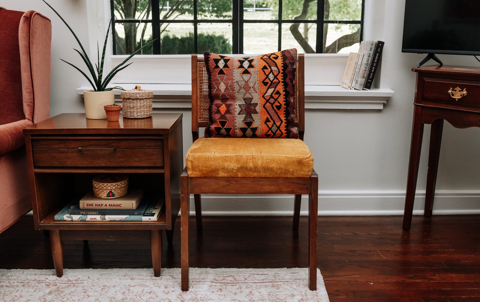 A chair brought back from Florida is one of her favorite pieces in the apartment of Jamie Curtis on Edgewater Ave.