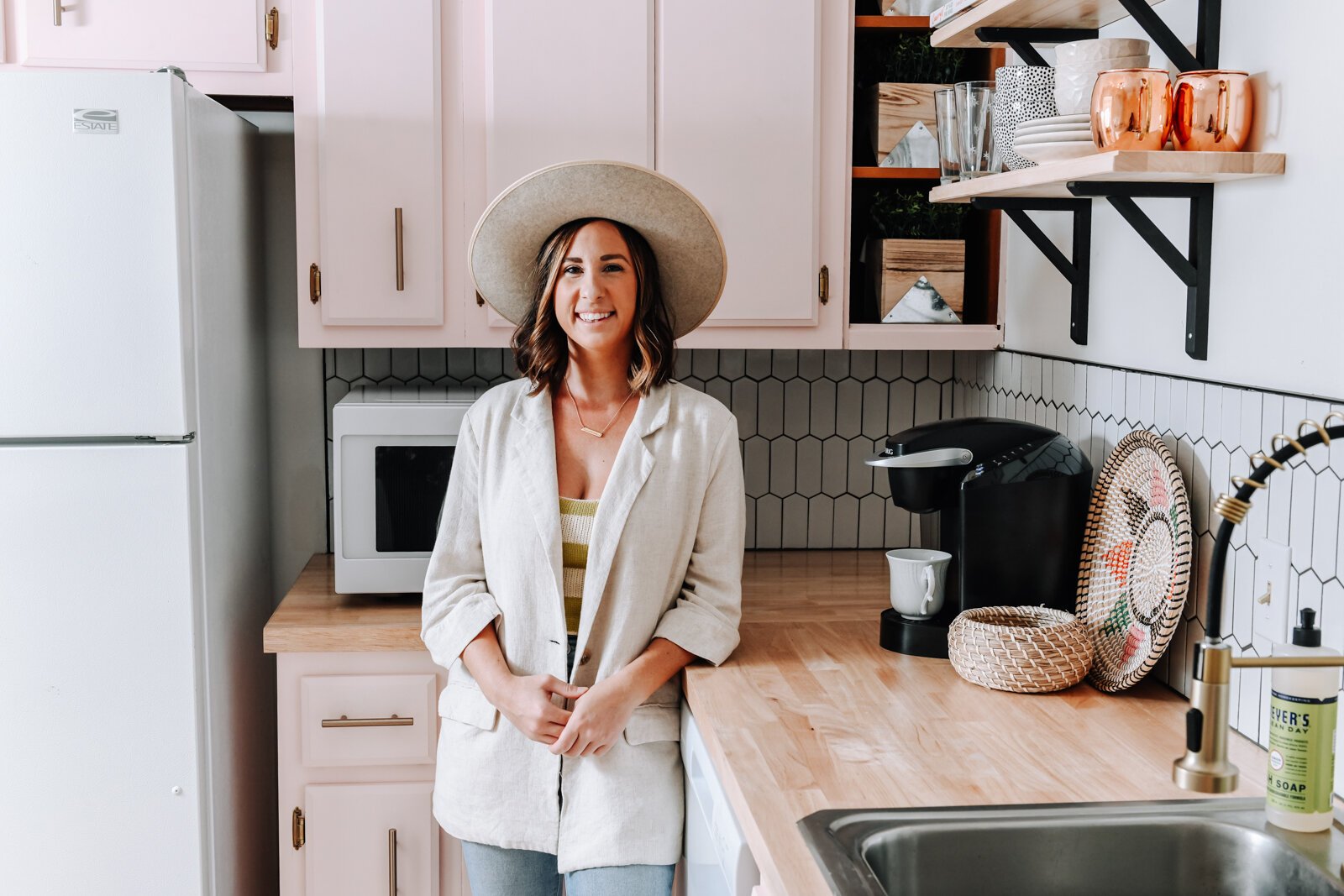 Olivia Nelson in the kitchen of her Airbnb, JetsetterBnb, in Fort Wayne.