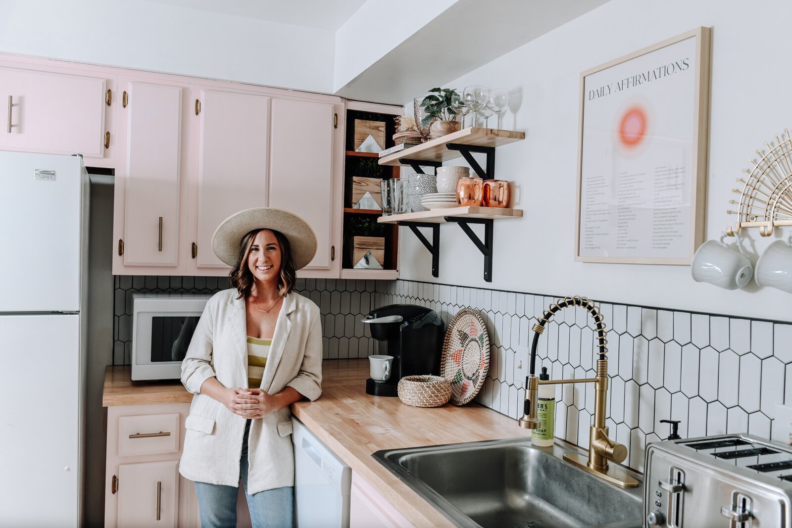 Olivia Nelson in the kitchen of her Airbnb, JetsetterBnb, in Fort Wayne.