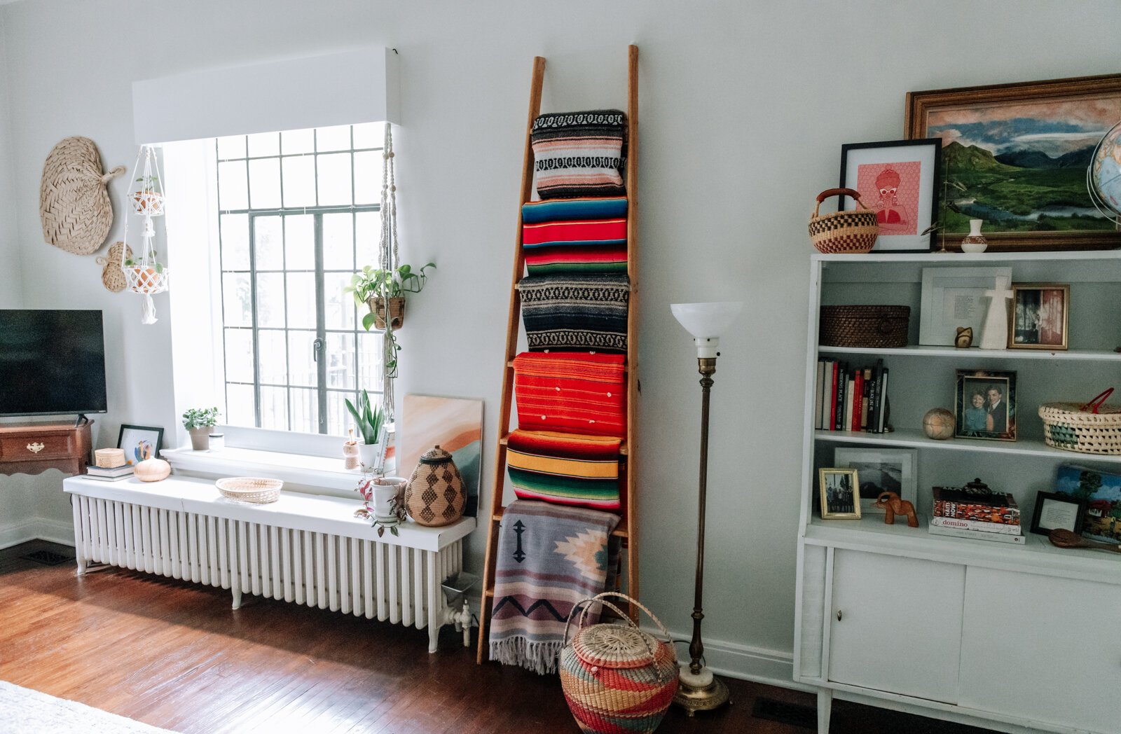 The blanket ladder is one of her favorite items in the apartment of Jamie Curtis on Edgewater Ave. in the Lakeside Park neighborhood.