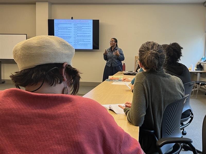 Angela Jackson-Brown speaks to patrons at ACPL.