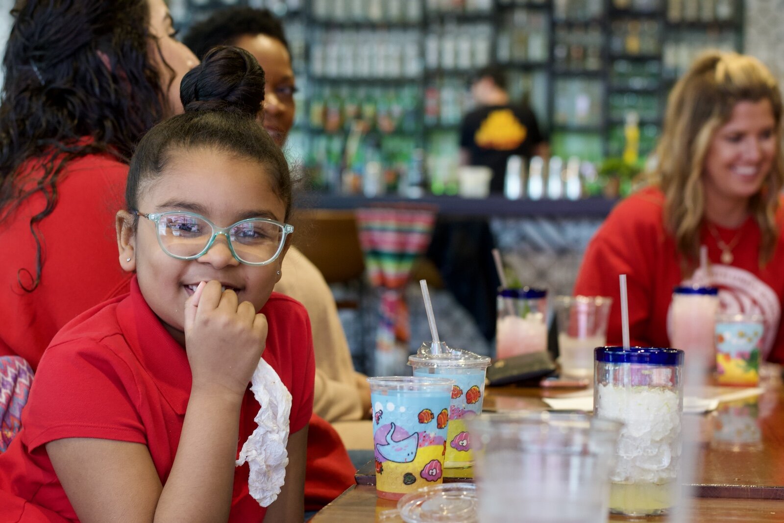 First Grade students in a Junior Achievement of Northern Indiana program attend a class trip to visit Mercado restaurant in Downtown Fort Wayne to learn from its local founder.