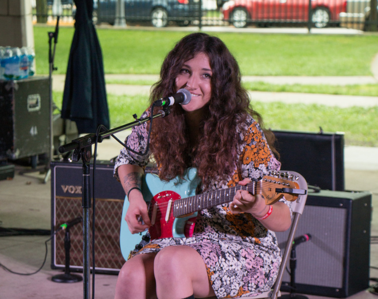 Jess Thrower entertains concert-goers at Middle Waves Music Festival.