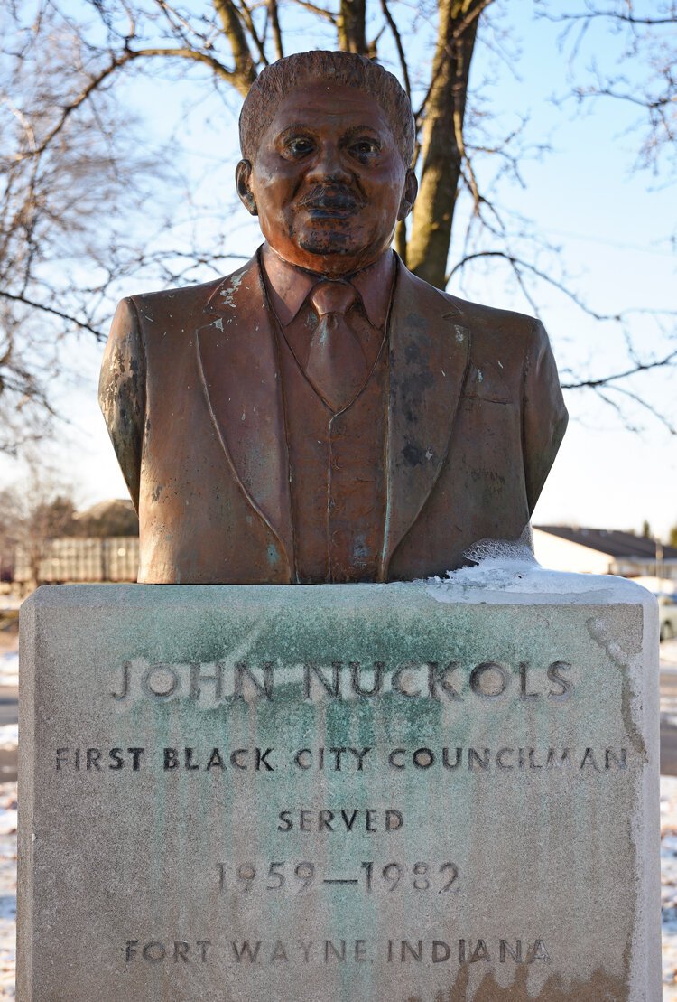 A bust of John Nuckols by Hector Garcia (1985) in Hanna Park at Maumee Ave. and Harmar St.