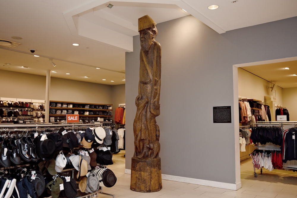 Fort Wayne’s “Johnny Appleseed” carving by L. Dean Butler now stands in the H&M store at Glenbrook Square Mall.