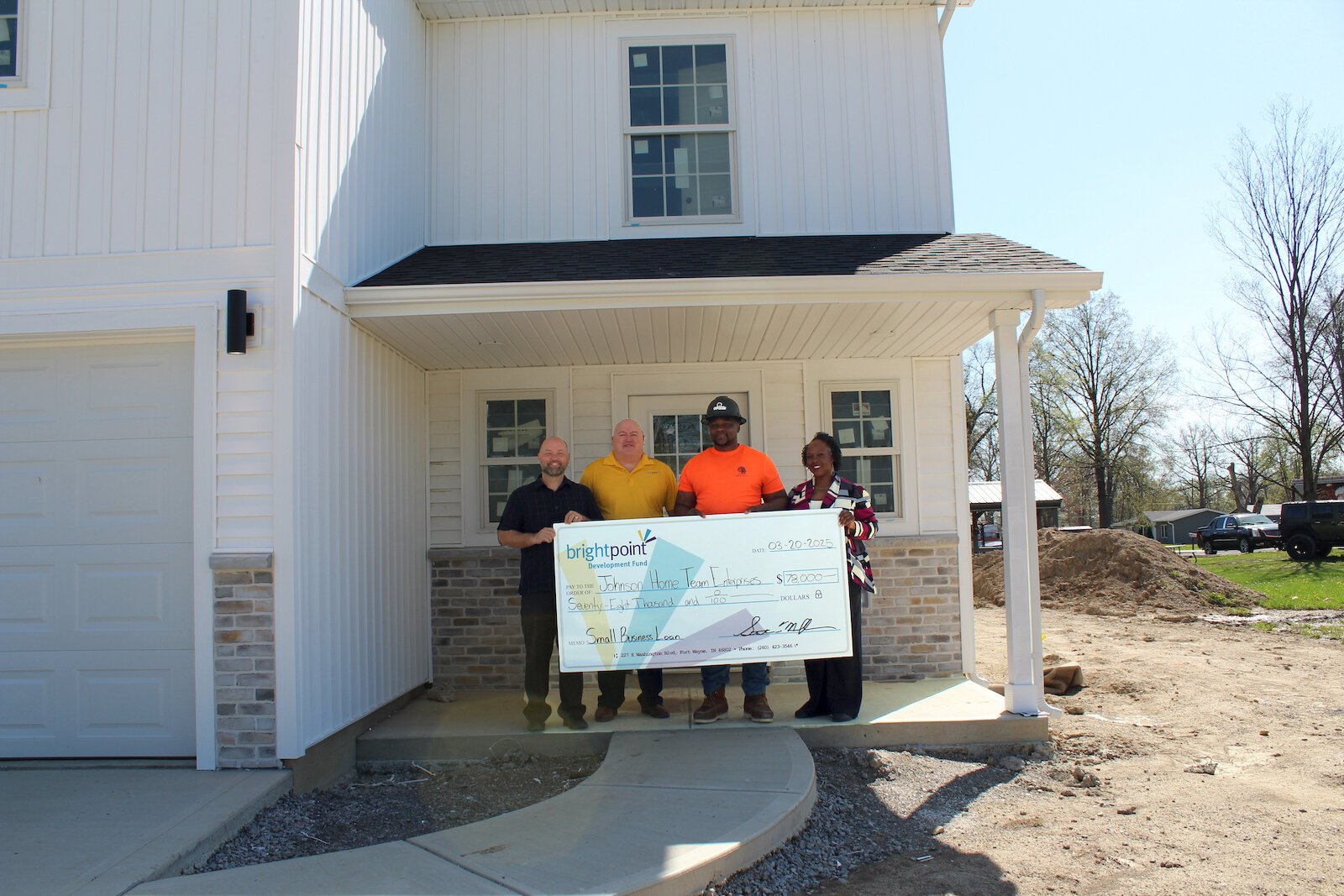 Brandon Johnson receiving a small business loan from Brightpoint, via the Legacy Fund. 