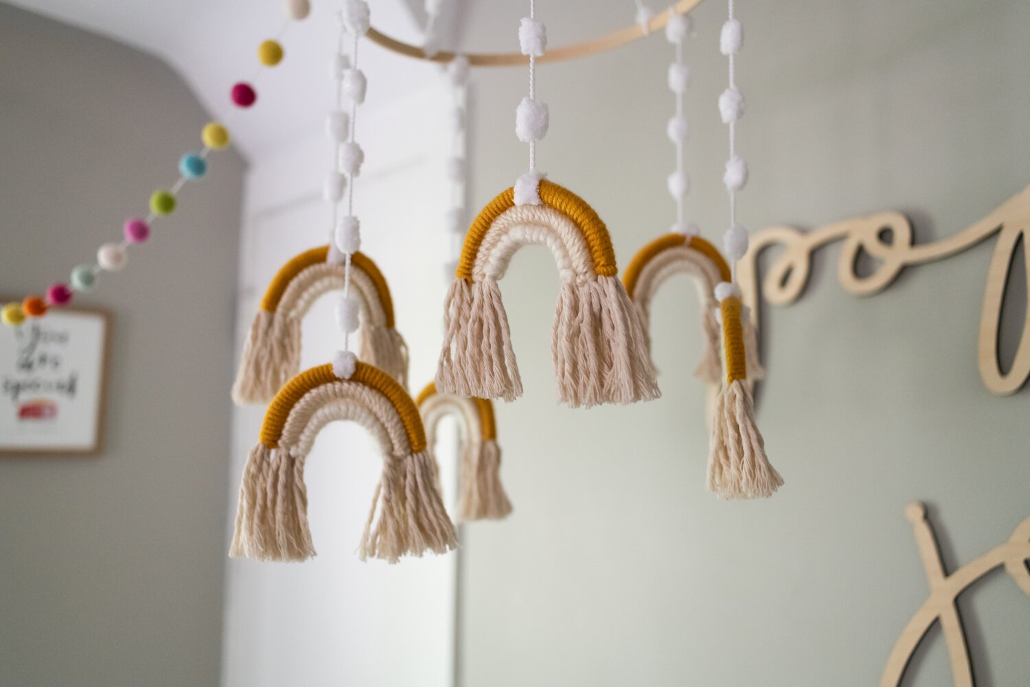 A rainbow mobile from Etsy in Poppy's room. 