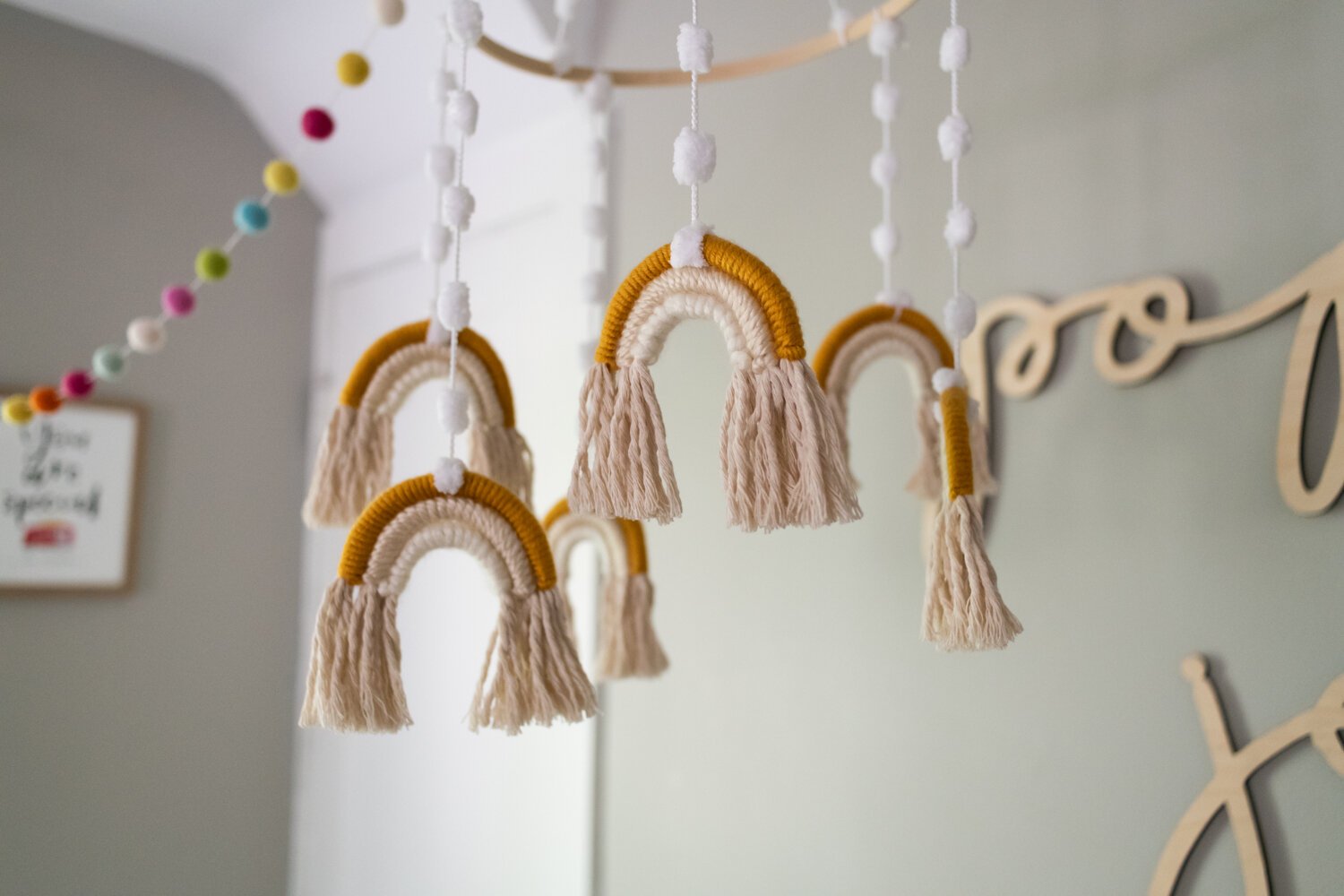 A rainbow mobile from Etsy in Poppy's room. 