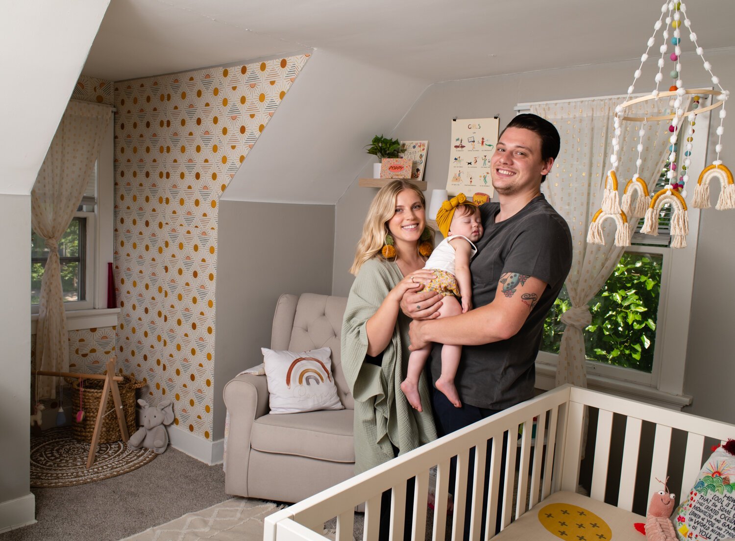 Katie Fyfe and her fiancé, Andy Gelwicks, with their 8-month-old daughter, Poppy, in Poppy’s room.