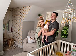 Katie Fyfe and her fiancé, Andy Gelwicks, with their 8-month-old daughter, Poppy, in Poppy’s room.