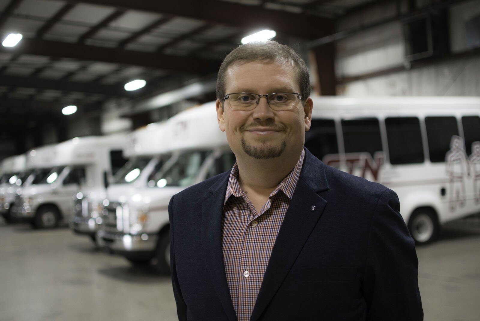 Portrait of Justin Clupper, Executive Director of Community Transport Network (CTN).