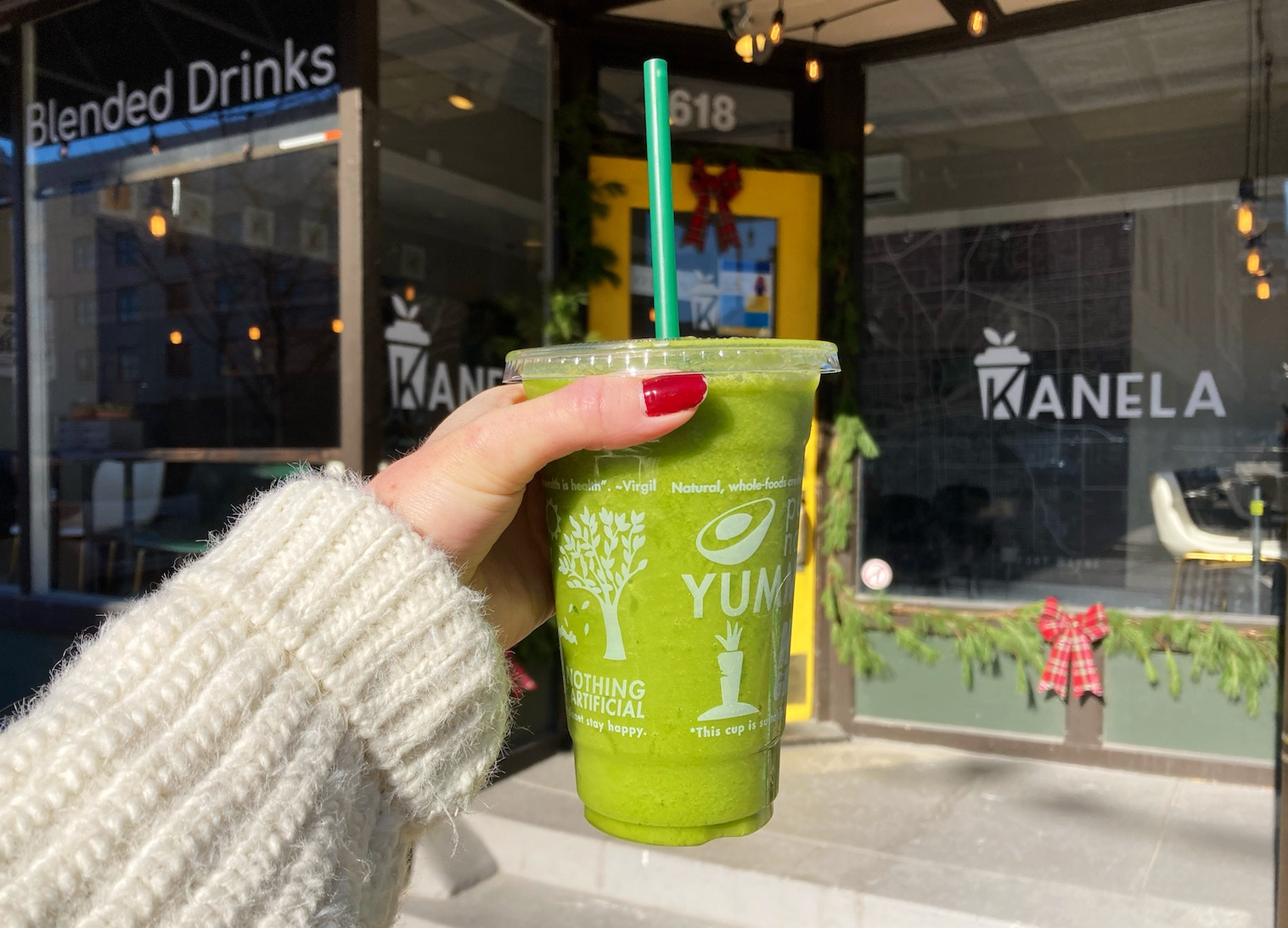 A Drink Your Veggies smoothie at Kanela, featuring pineapple, mango, spinach, parsley, and celery.