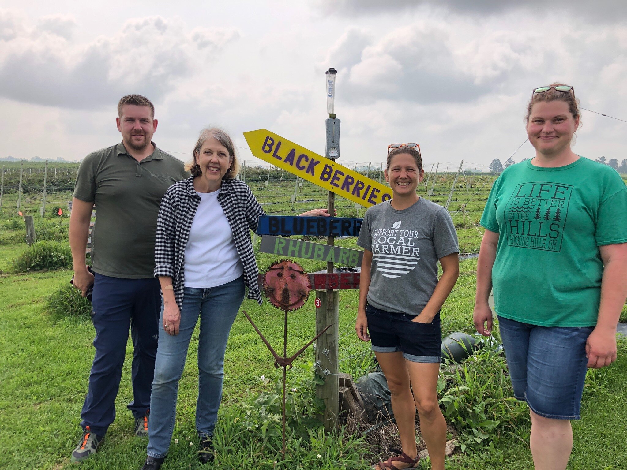 Katz, second from the left, works with regional farmers and food producers as Founding Director of the Northeast Indiana Local Food Network.