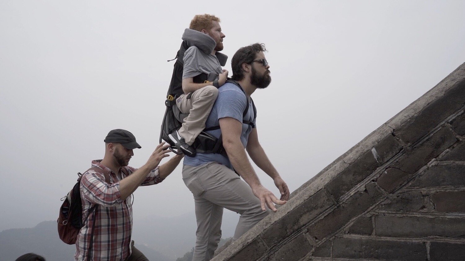 Kevan Chandler of Fort Wayne, center, has become a globe-trotting ambassador for people living with disabilities.