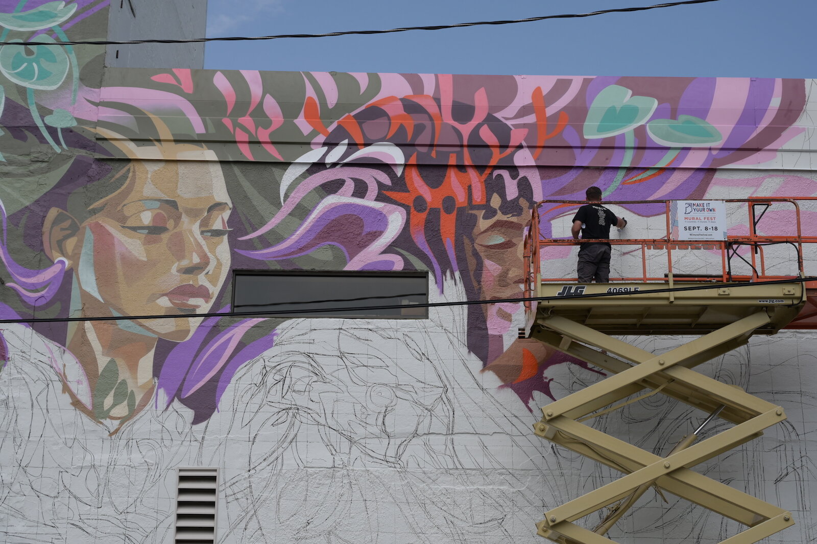 The theme of Key Detail’s mural is the confluence of the city's three rivers: the St. Joseph, the St. Marys, and the Maumee.