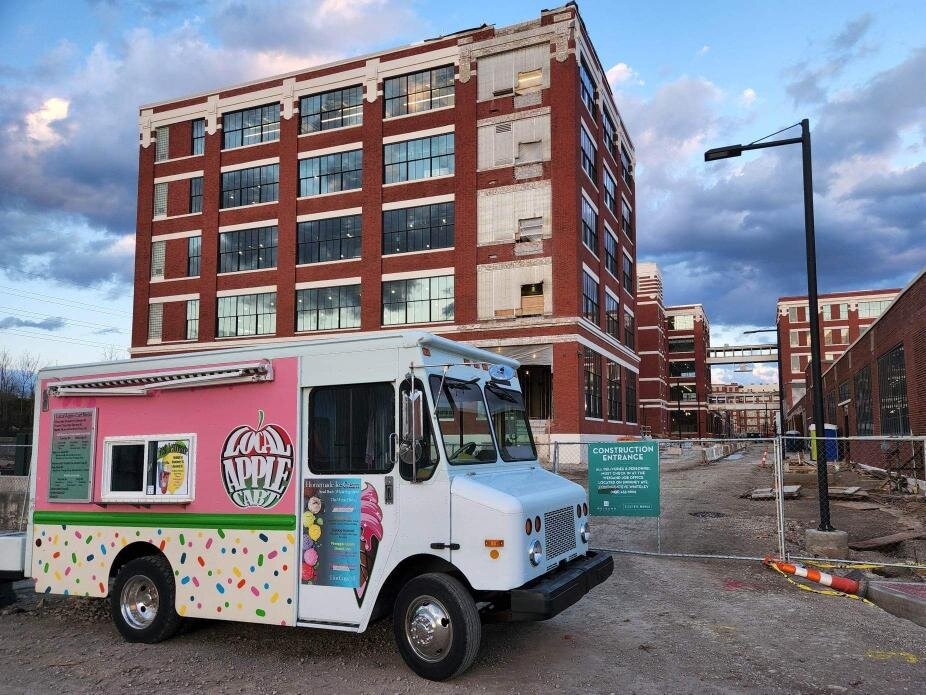The Local Apple Cart food truck parked outside the Electric Works campus.