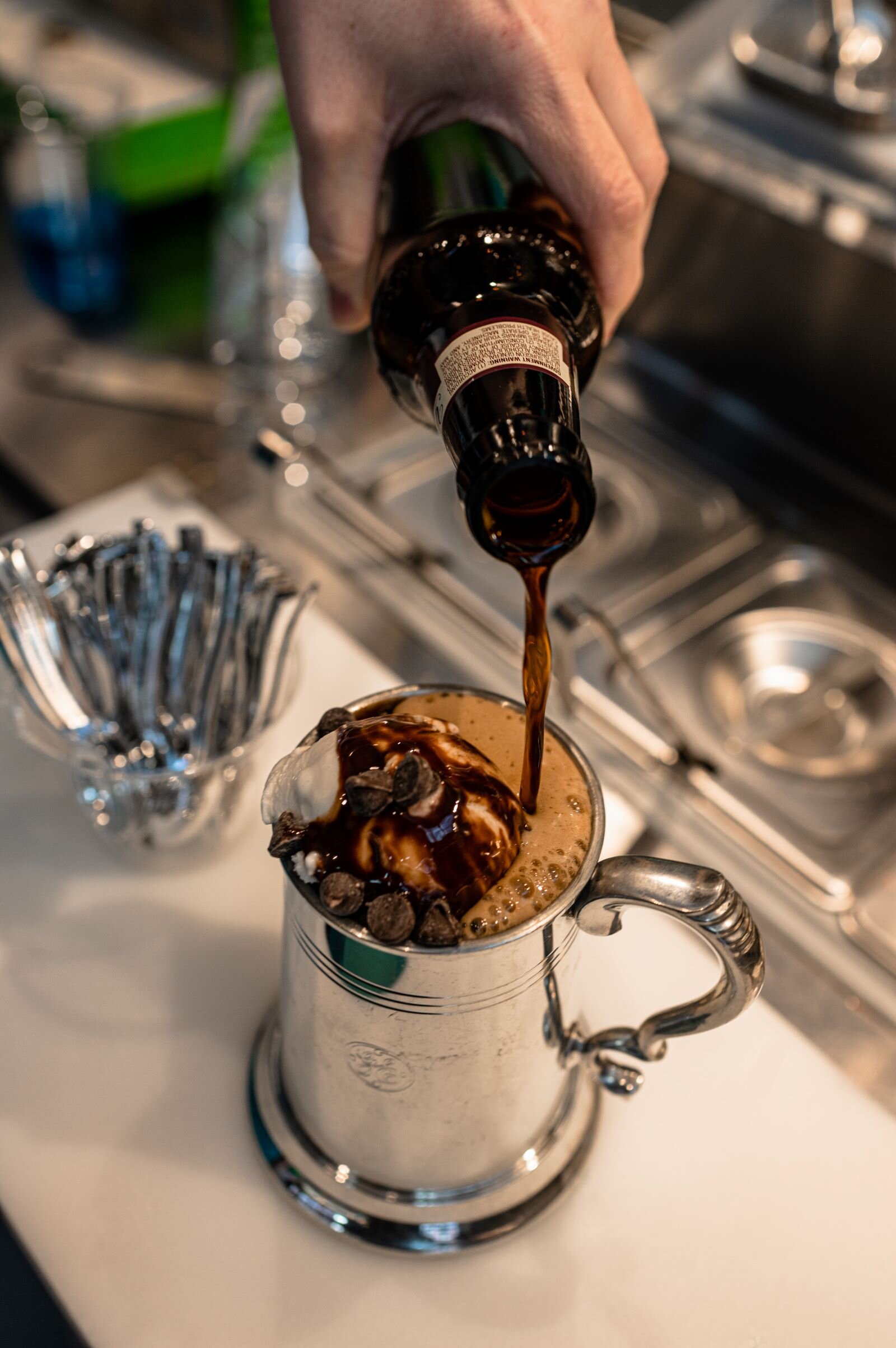 Rachel Nally, owner of Local Apple Cart, makes a beer float.