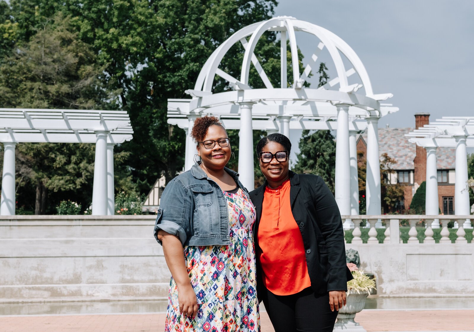 LaQueisha Brown, right, and Myla Rogers, left, catch up with one another at Lakeside Park.