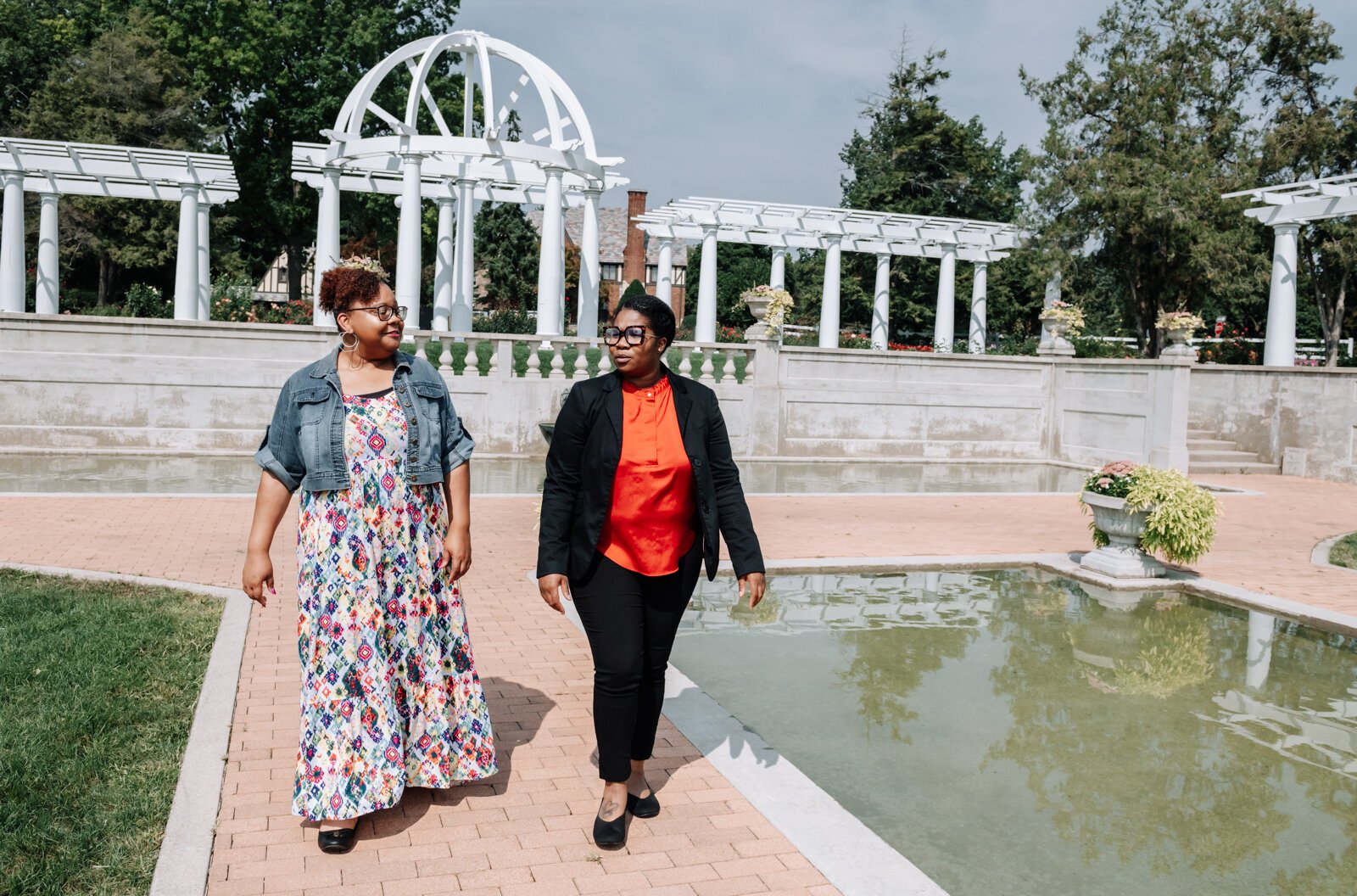 LaQueisha Brown, right, and Myla Rogers, left, catch up with one another at Lakeside Park.