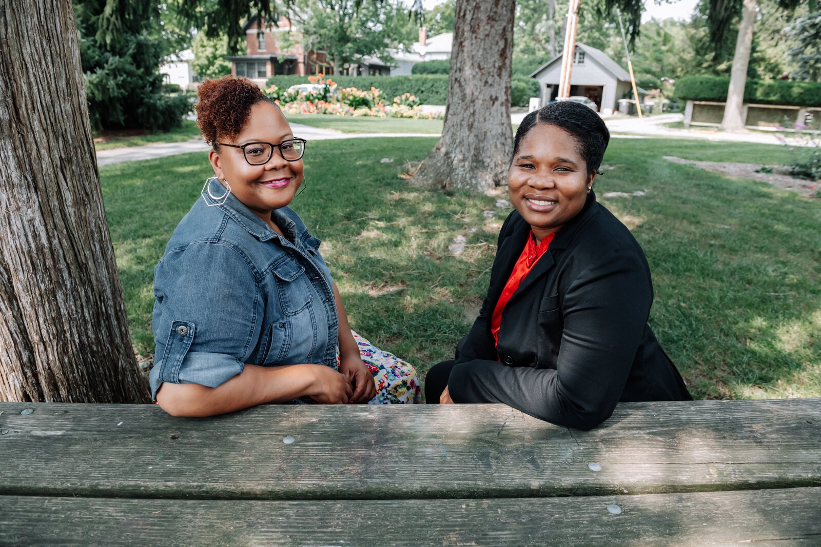 LaQueisha Brown, right, and Myla Rogers, left, catch up with one another at Lakeside Park.