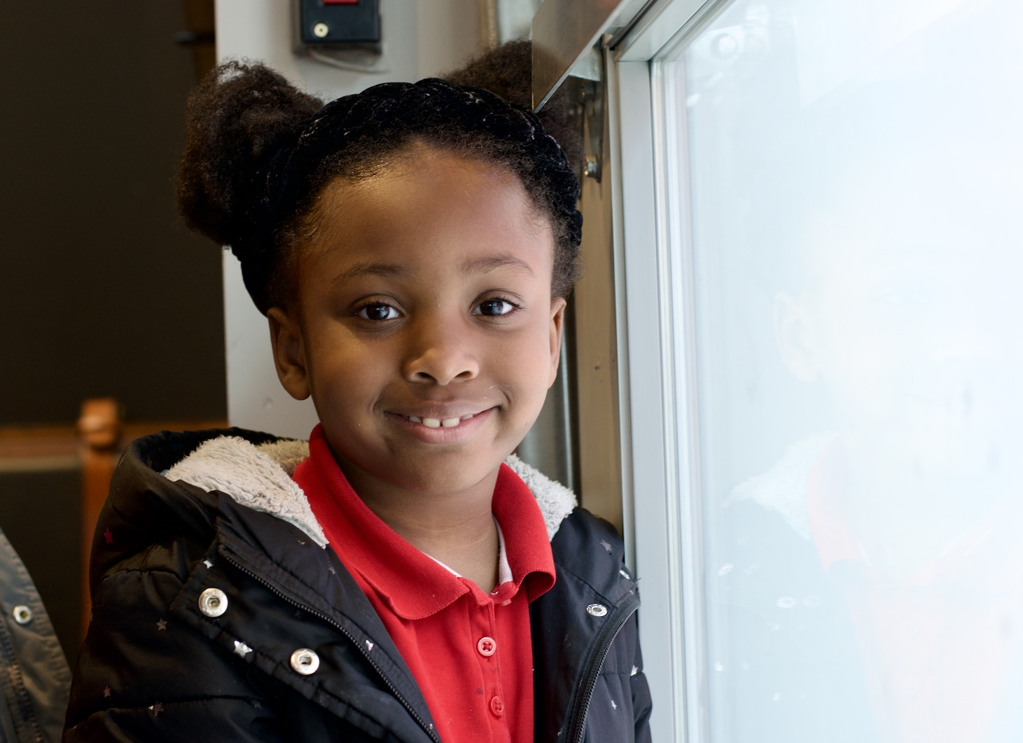 First Grade students in a Junior Achievement of Northern Indiana program attend a class trip to visit Mercado restaurant in Downtown Fort Wayne to learn from its local founder.