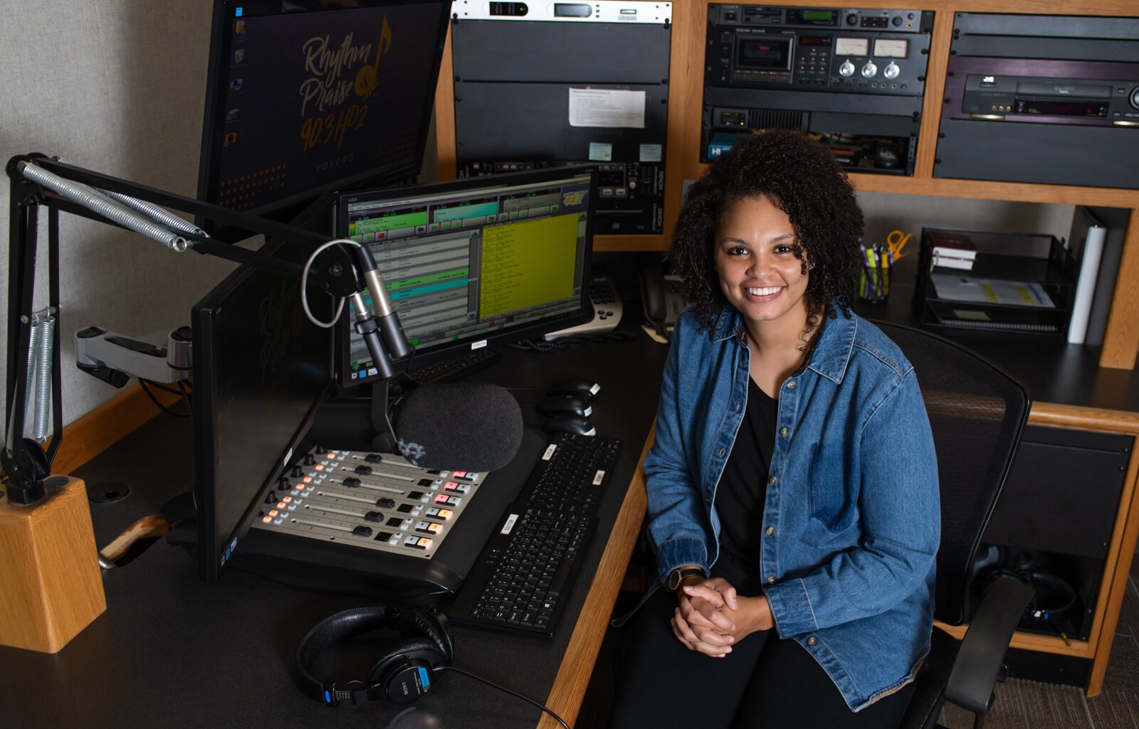 Monique Moss, Program Director/On-Air Personality at Rhythm & Praise 90.3 HD2, works at the station at 1115 W. Rudisill Blvd.