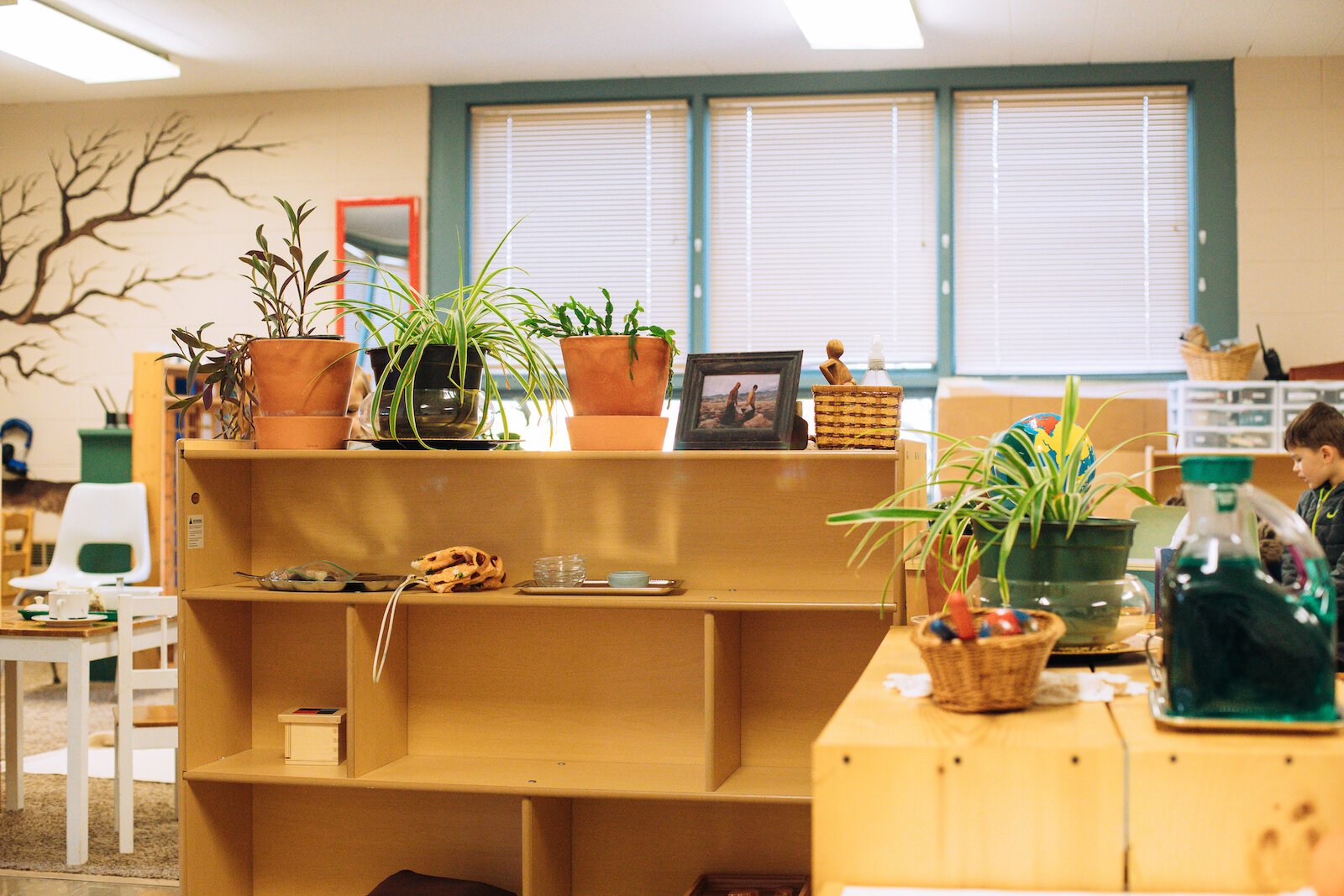 Montessori classrooms are full of natural materials such as wood, metal, and linen. Activities within the room are meant to concentrate and investigate purposefully designed activities.