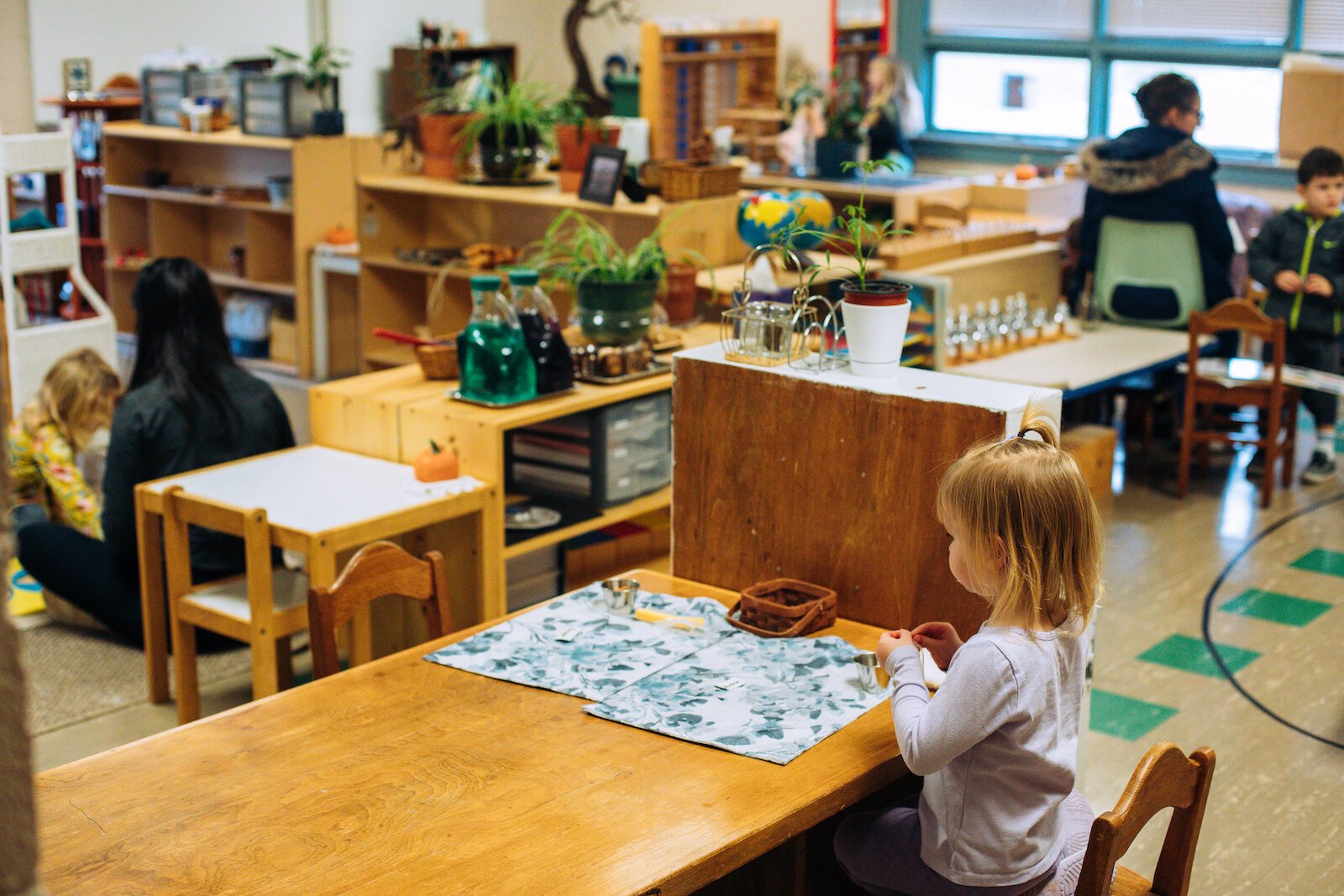 Montessori Education allows children to choose how to engage with the class environment, which is composed of purposefully designed activities.