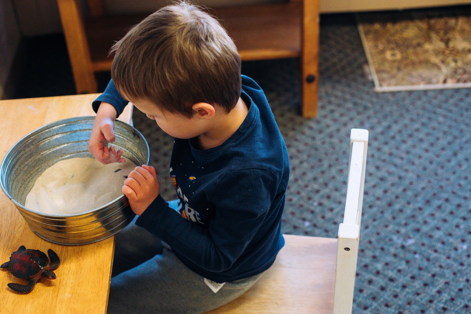 Montessori Education allows children to choose how to engage with the class environment, which is composed of purposefully designed activities.