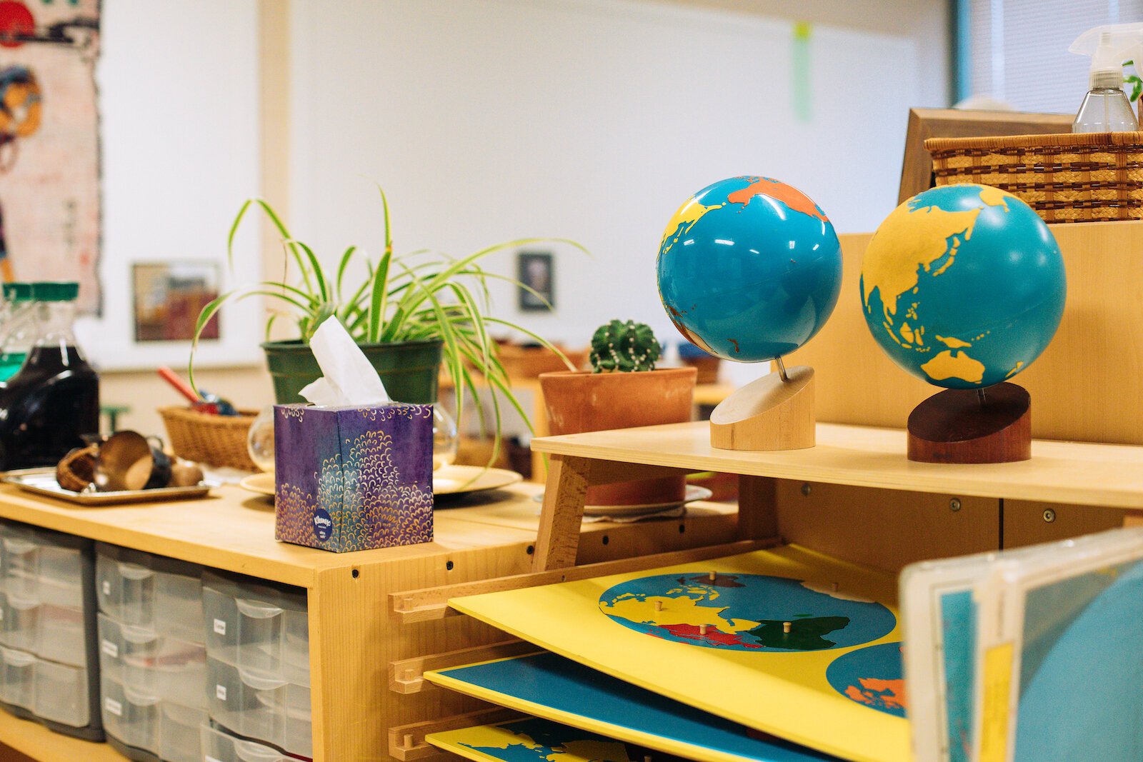 Montessori classrooms are full of natural materials such as wood, metal, and linen. Activities within the room are meant to concentrate and investigate purposefully designed activities.