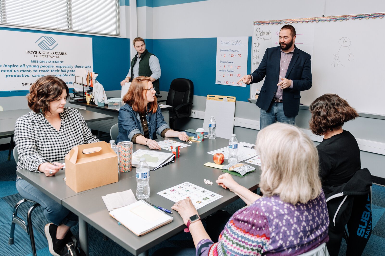 Dan Baisden talks with residents during the Packard Area Planning Alliance retreat at the Boys and Girls Club on Fairfield Ave.