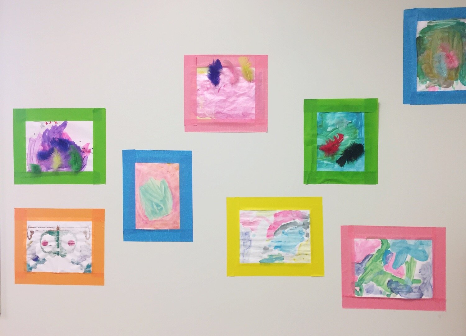 Artwork made by children at the Shaw Center decorates the walls.