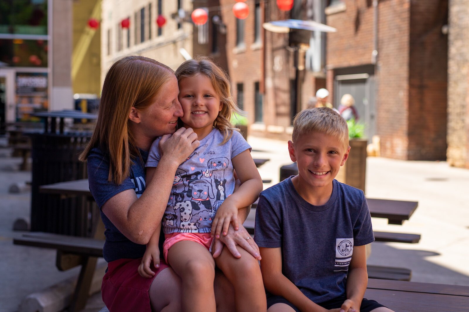 Nikki Fultz's wife Kara carried their two youngest children, Riley, 3, and Tegan, 9, photographed here.