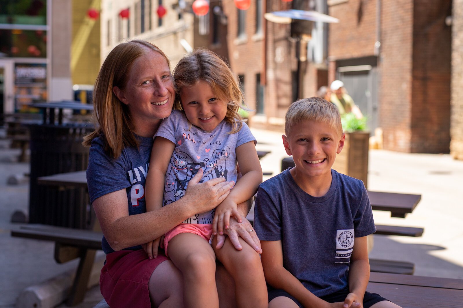  Nikki Fultz's wife Kara carried their two youngest children, Riley, 3, and Tegan, 9, photographed here.