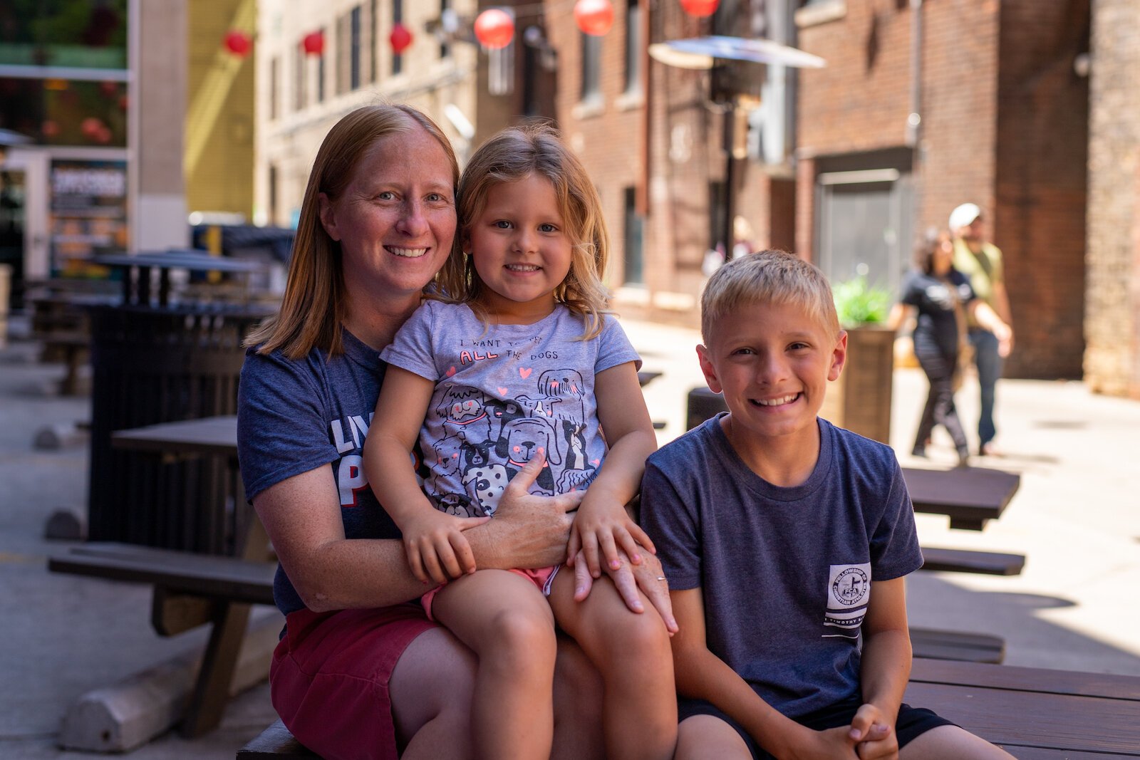  Nikki Fultz's wife Kara carried their two youngest children, Riley, 3, and Tegan, 9, photographed here.