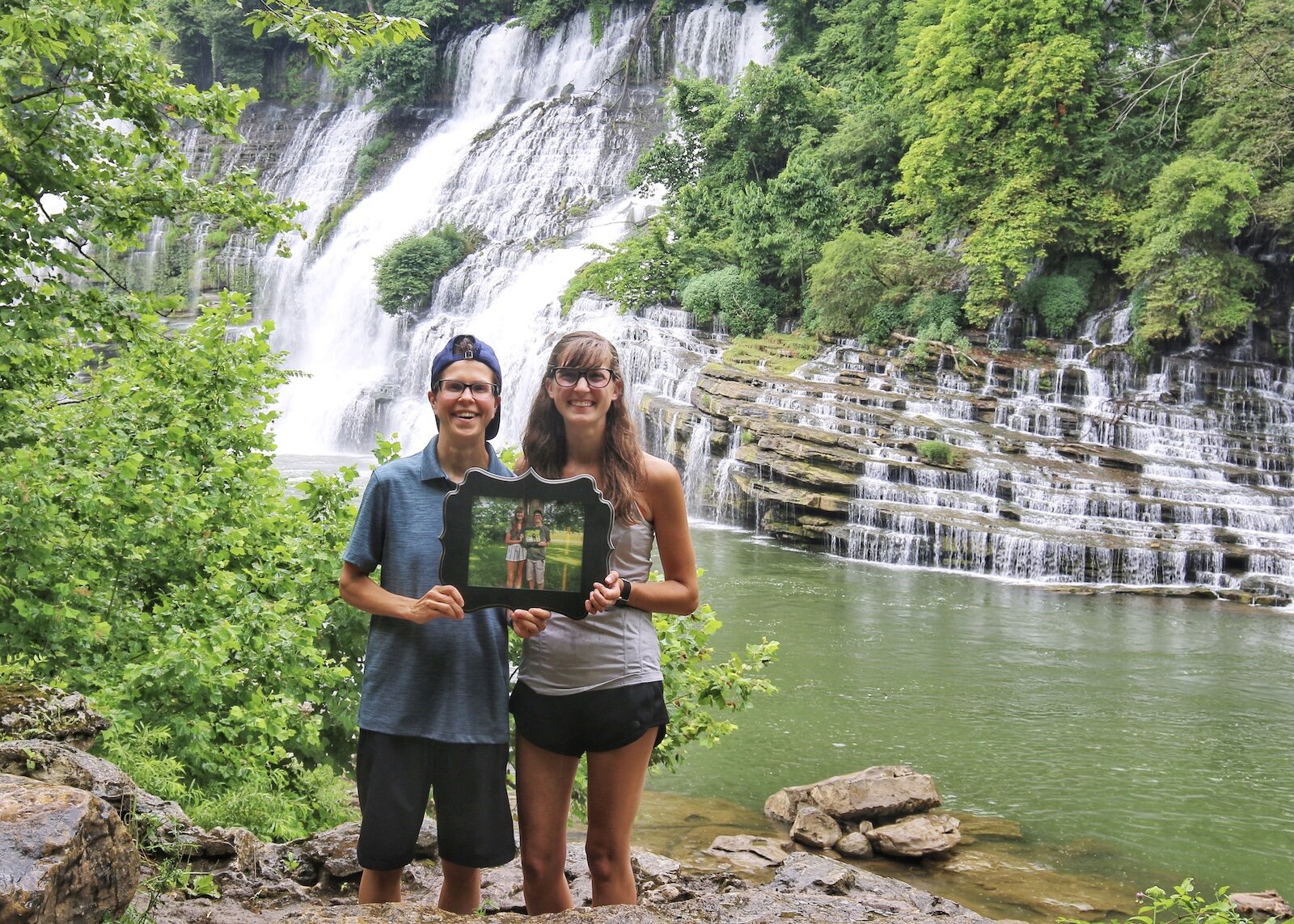 Alexys and Erica Esslinger pose in Rock Island State Park in Tennessee for their annual anniversary photo.