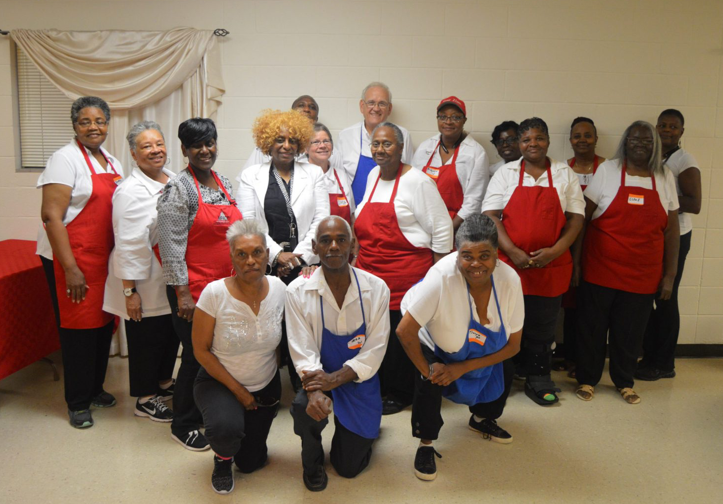 A group portrait of a HEAL Cooking Class in 2017.